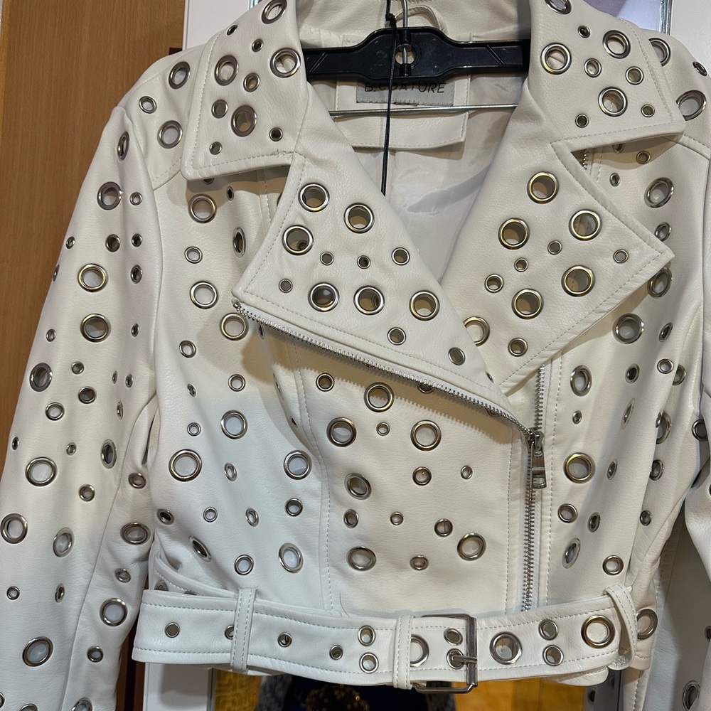 B. COATURE WHITE LEATHER JACKET